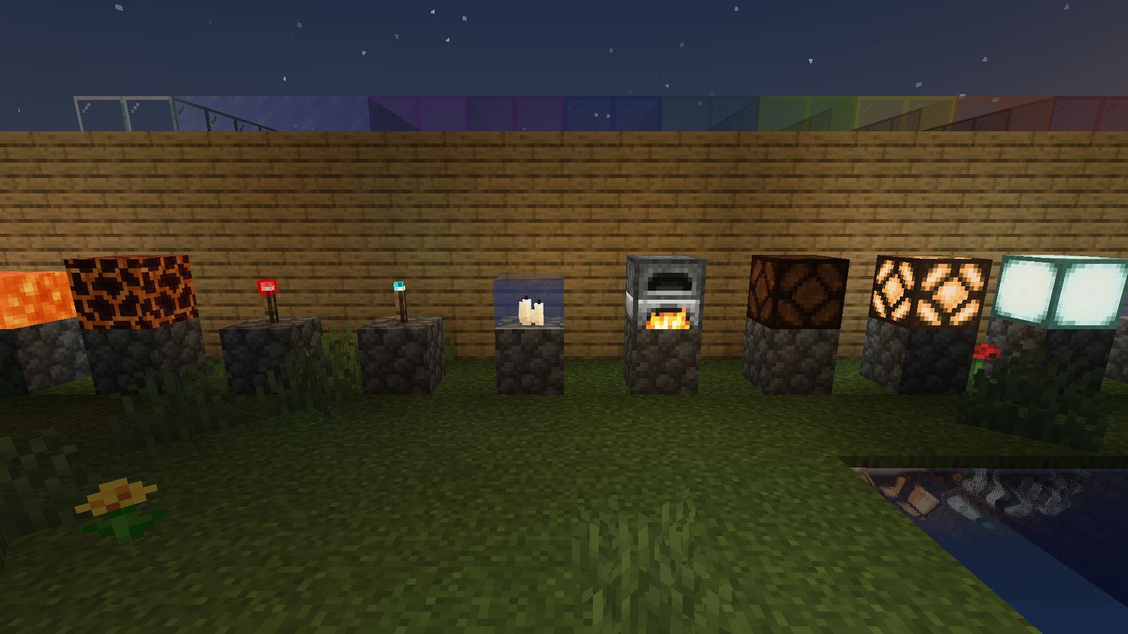 Lanterns, lava and lamps lighting the scene at dusk